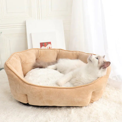 Soft beige plush cat bed with white cushion, featuring a fluffy rag doll cat lounging comfortably – cozy and stylish pet bed for cats and small dogs