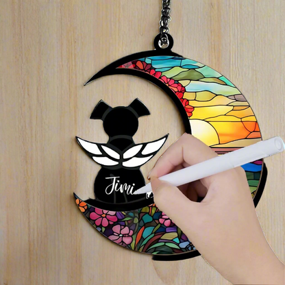 Personalized pet memorial sun catcher with angel dog silhouette, colorful stained glass moon design, and custom name engraving