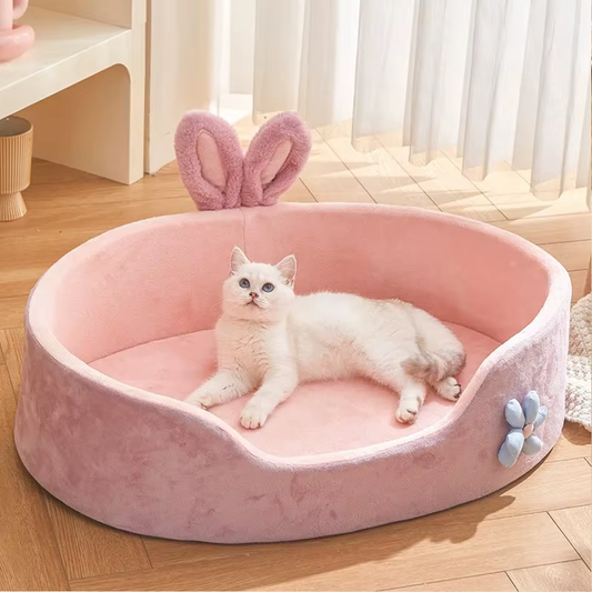 Soft pink cat bed with bunny ear design – cozy plush kitten bed with raised sides for small pets